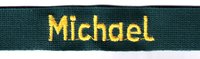 dunkelblauer, schmaler, längliches Rechteck mit zentrierter goldener Schrift "Michael"